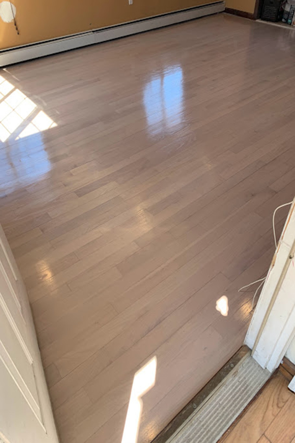 Floor refinishing high-traffic apartment